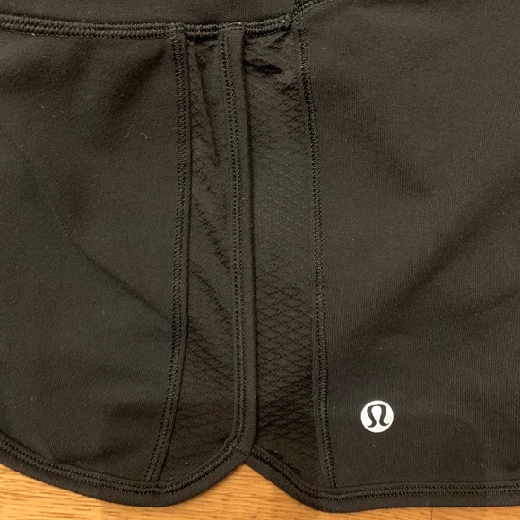 Black Lululemon athletic shorts. - Picture 5 of 7